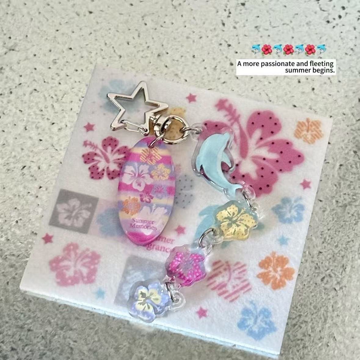 Tech Girl Accessories - Portachiavi Estivo Hawaiano con Delfino e